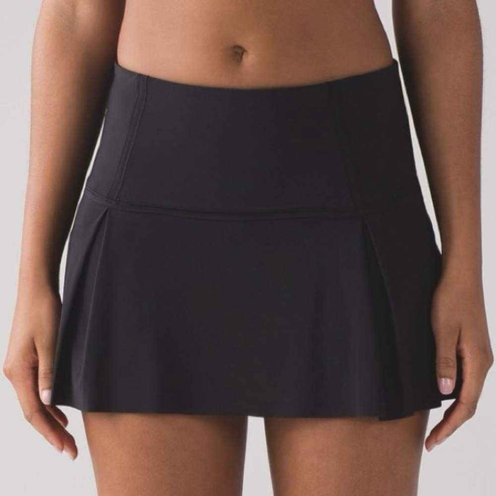 Lululemon Women’s Pace Skirt. Built in shorts. Size 12. Black.